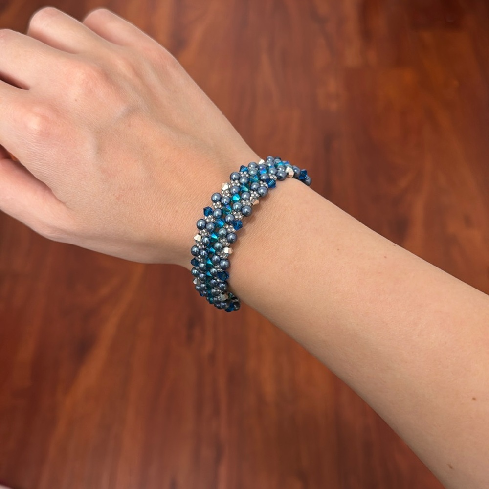 Handmade bracelet. Evenly sized beads and crystals. Sits beautifully on wrist.